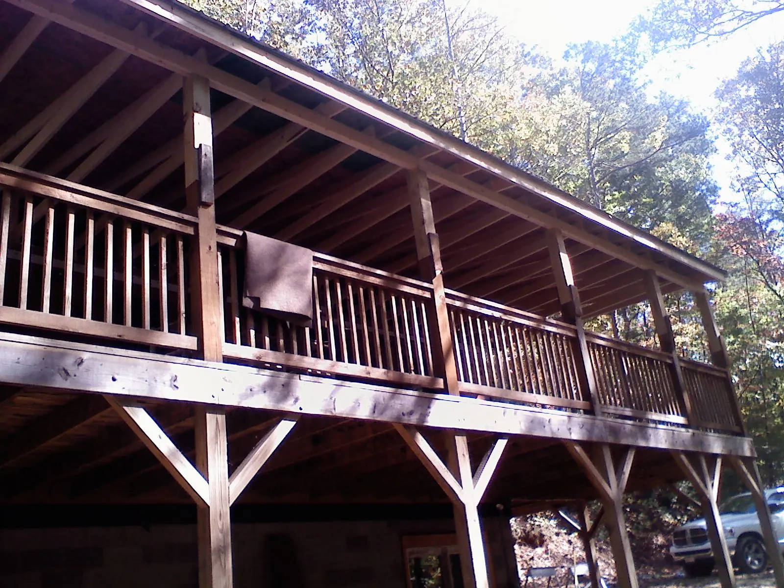 Timber framing under a new elevated porch and deck — Roof Leak Repair in West Liberty by Roofing Brothers